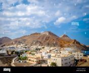 small sleepy village with mountains and blue sky in the background in muscat oman mb922p.jpg from oman small