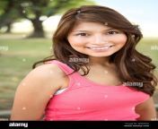 young hispanic girl smiling outside mwr96r.jpg from www xxx video 12yers indian