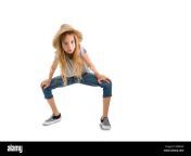 cute thin young girl in a trendy straw hat and denim jeans crouching down looking at the camera isolated on white with copy space p8r0wd.jpg from thidjn young