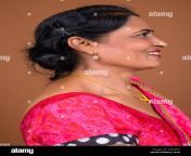 profile view of happy indian woman smiling pxm49g.jpg from indian wife side se