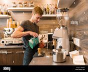 young male coffee shop worker making coffee with machine rn8rdf.jpg from young working coffee shop jpg from young 16yer and xxx sexi video download www pakistani young sexy xxx