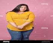 chubby woman unsure of herself looking down isolated and rejected curvy latina woman tx84n1.jpg from cubby latina