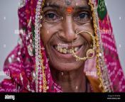 old rajasthani woman with huge nose ring and dirty teeth wtapda.jpg from indian aunty heavy jewellery
