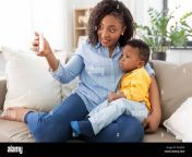 african mother with baby son taking selfie at home w23gx6.jpg from www mom and so