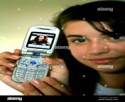 a teen girl downloads a music video onto a 3g capable mobile or cell a4aymm.jpg from mother son sex manipur video downloads waptrickদে teen girl force