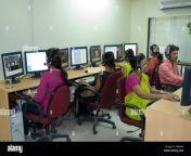 people working at an outsourcing call center based in mumbai india a64w0h.jpg from indian office l