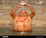 a man takes a religious bath to clean his soul from past sins in the a1pa3d.jpg from indian old man dhoti bath nude penis