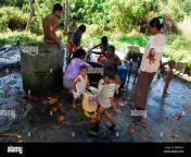 moken people taking a bath at village artesian well koh lhao ranong bbbwdh.jpg from village says bath