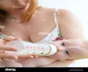 mother feeding giving a milk bottle to her sweet baby bjn1pe.jpg from sweet milk from her