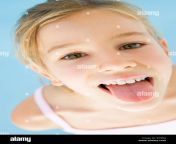 young girl sticking her tongue out b34ekj.jpg from young stick tongue out