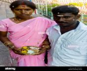 a young hindu couple presenting their offerings at the meenakshi amman c7c04y.jpg from neyveli aunty dress change