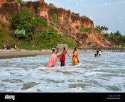 indian women bathing in the arabian sea varkala beach kerala india c4g0yb.jpg from kerala bathing