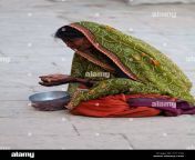 woman begging at the ghats in varanasi india cy113g.jpg from indian bhikari