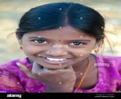 smiling happy indian village girl wearing a pink dress andhra pradesh c12nmr.jpg from desi village cute cre