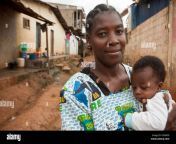 a young single mother holds her infant son outside her house in yaounde c0kmg9.jpg from 7yars son vs mother villege sex videosrse fuck