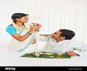 south indian man feeding food to his wife d500hf.jpg from feeding indian