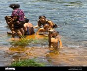local people taking a bath in the river at the teuk chhou rapids in d9thpd.jpg from open bathin in river