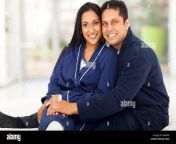 beautiful loving indian couple sitting in bedroom da06p8.jpg from india husb