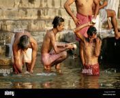 pilgrims bathing in the ganges river varanasi india dfpp57.jpg from bihari village bathing h