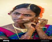 rural indian village bride dressed in colourful sari and gold jewelry dkhg5d.jpg from indian village bangle body