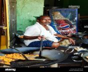 an indian man cooking street food dpd07b.jpg from indian cook