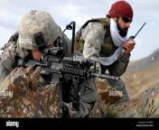 us army soldier and an interpreter keep watch from a mountain ridge d16fe0.jpg from afghanistan jung old video