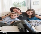 mother and kids 8 9 10 11 sitting on sofa e4ntwd.jpg from 11 mom and son