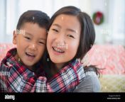 asian brother and sister hugging ere13x.jpg from barther and sister
