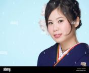 a portrait of a beautiful young japanese girl in a blue kimono for fgcbnb.jpg from japani gurl