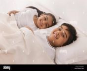 portrait of smiling brother and sister sleeping in bed gg582x.jpg from brother sleeping sister sucking