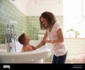 mother and son having fun at bath time together hm7tp2.jpg from mom and son hidden bath