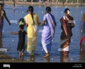 india tamil nadu river women girls water stand bathe back view asia j4kjn0.jpg from tamil bath