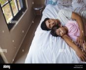 father and daughter sleeping together in bedroom at home j9rcnd.jpg from com sleeping daughter father fuckাব