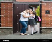 cute girl kissing mother before leaving for school jby2eh.jpg from school lady kiss