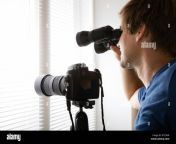 man spying with binoculars kt23nr.jpg from spying