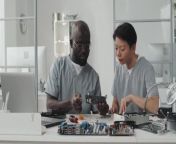 stock video african american male engineer discussing computer chip asian female colleaguevideostaticpreviewtruetoken from african xxx videos american video