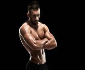 stock photo muscular bodybuilder guy doing posing from roughman inject