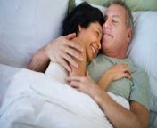 1140 happy mature couple laying in bed.jpg from hairy young couple