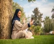 image 94688 making video call over phone saudi arab gulf woman sitting preview.jpg from saudi arabia video call