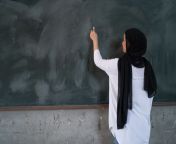 teacher at chalkboard.jpg from school xxx techar 10th calls