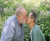 2545980.jpg from old man kissing in front of brother
