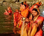 devotees perform rituals during chhath puja 930435.jpg from puja image